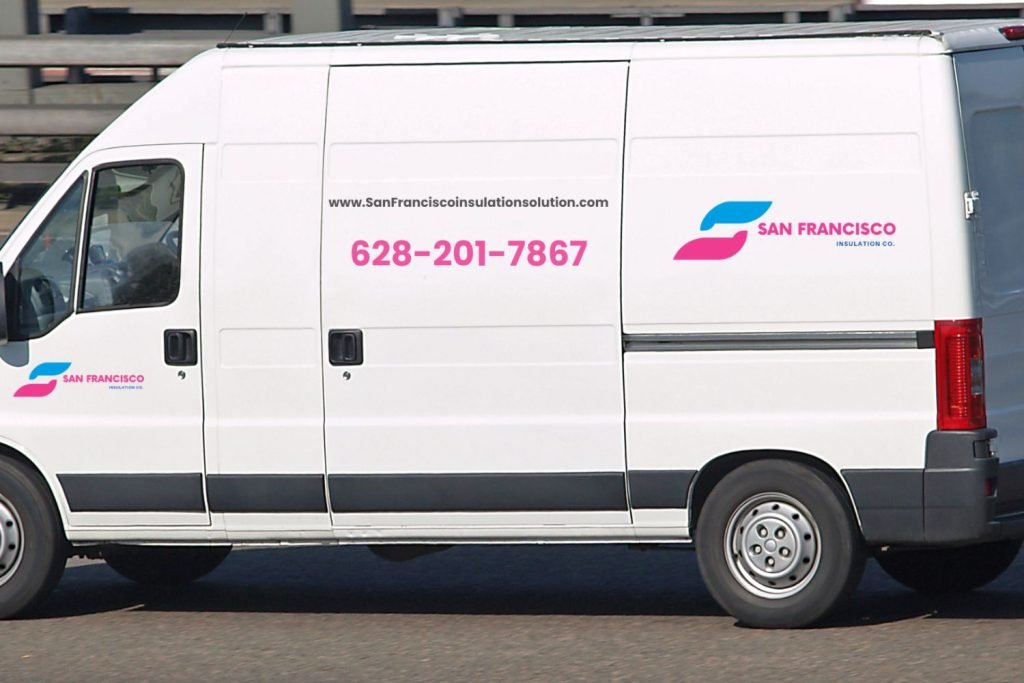 A white delivery van with pink accents, featuring "San Francisco" and contact details prominently displayed on the side.